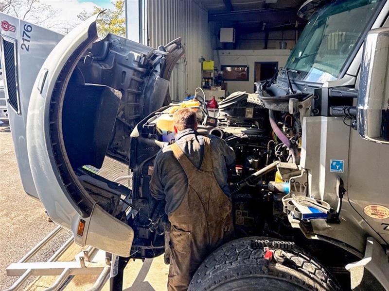 mechanic working on Jacobus truck